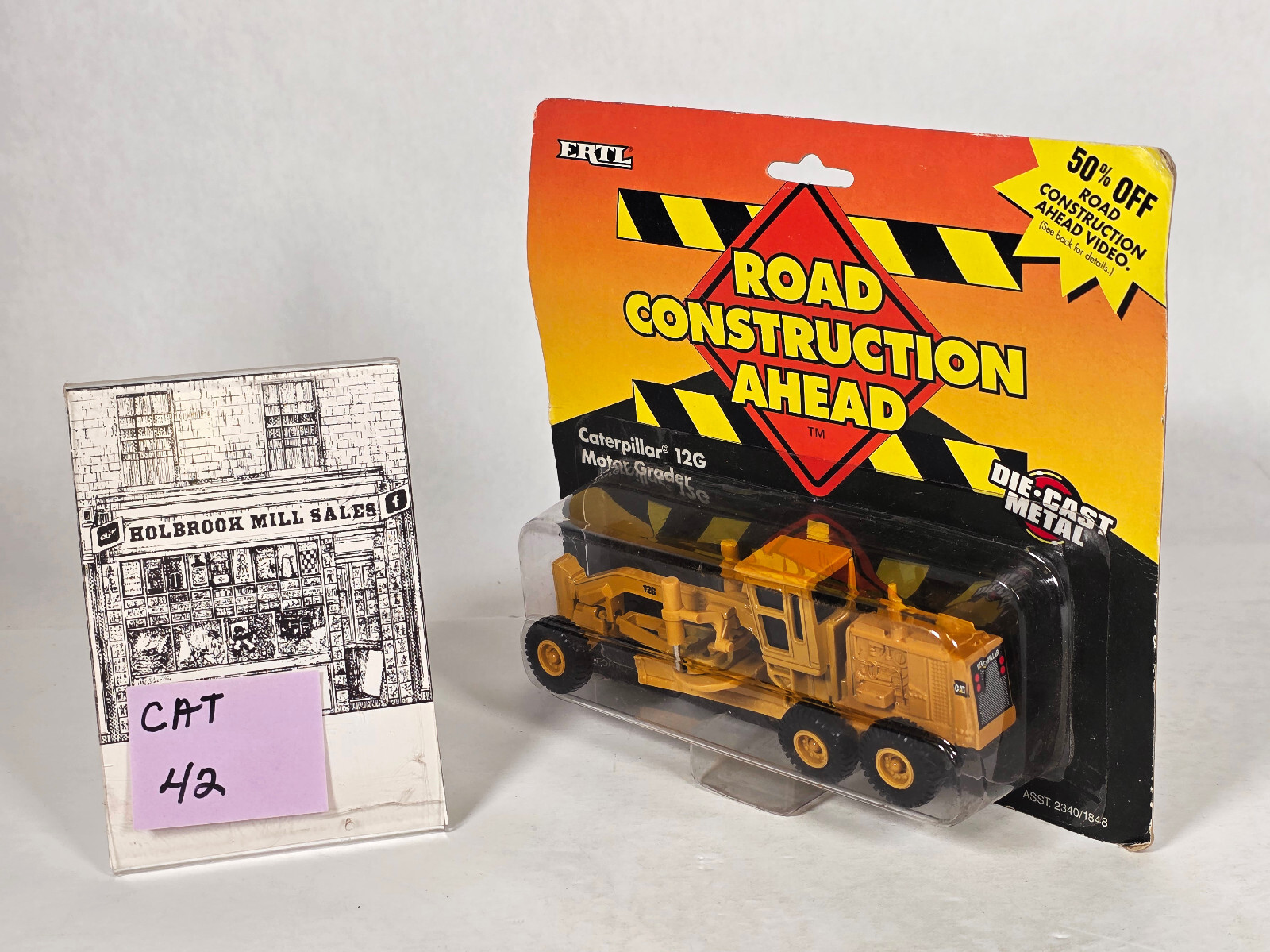 Ertl 1848 • Caterpillar • CAT 12G Motor Grader • New in Blister Pack