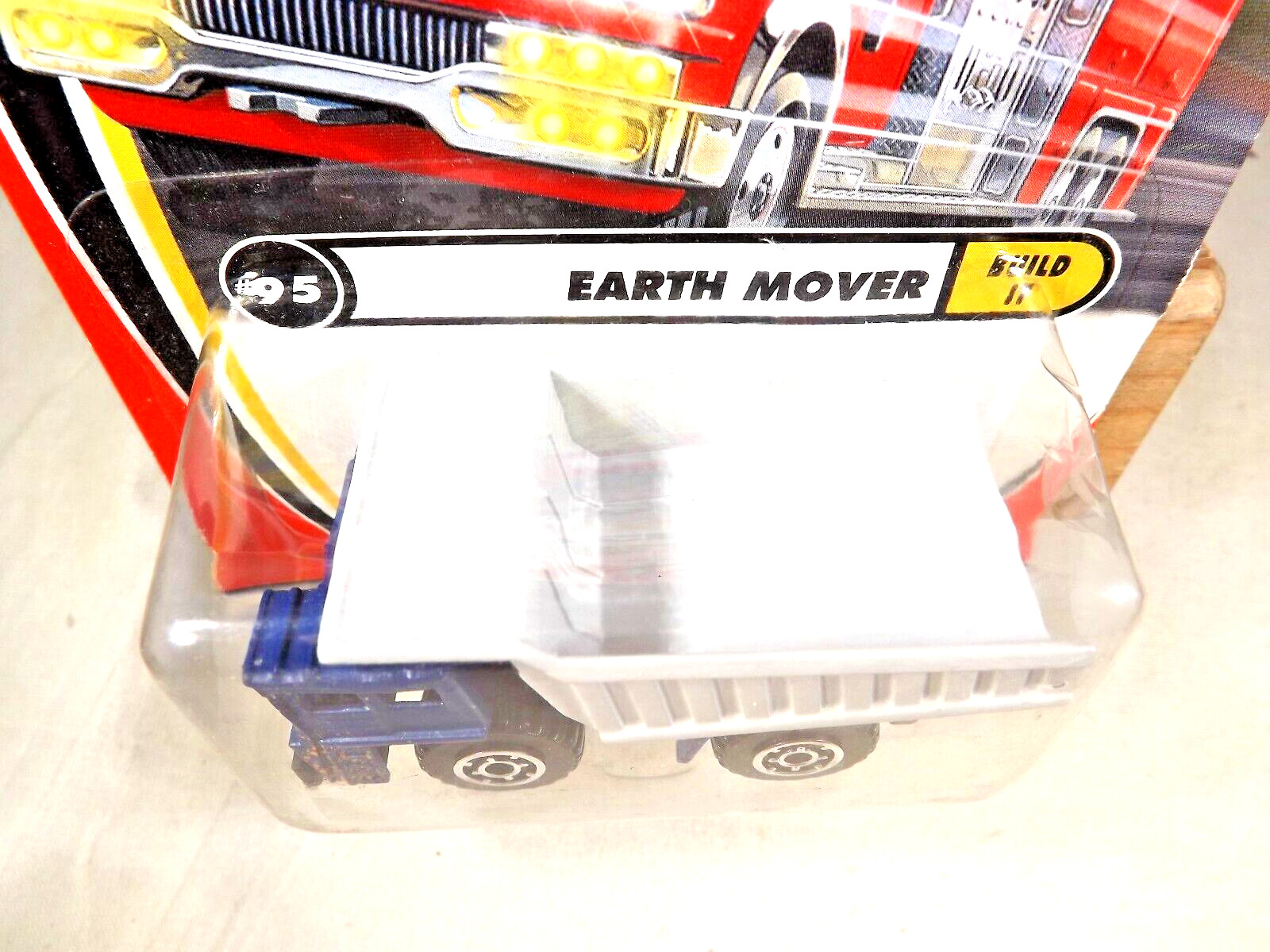 2000 Matchbox #95 Build It EARTH MOVER Blue-Gray w/MCAT Spokes Fire Truck Card