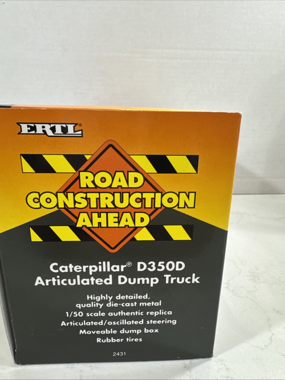 Ertl 2431 • Caterpillar • CAT D350D Articulated Dump Truck • 1:50 Scale NIB