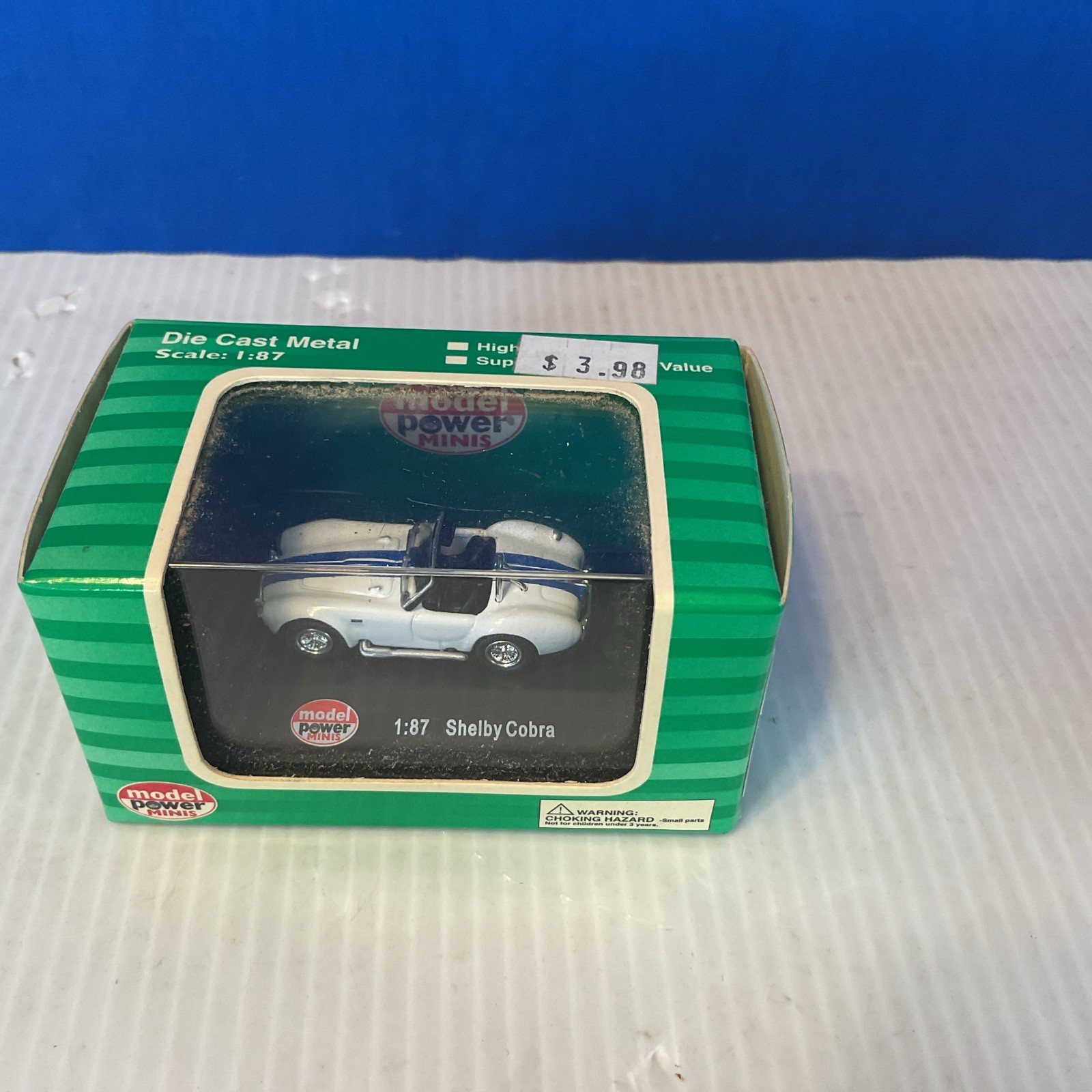 Model Power Minis #19225 Shelby Cobra White With Blue Stripes 1/87 Scale