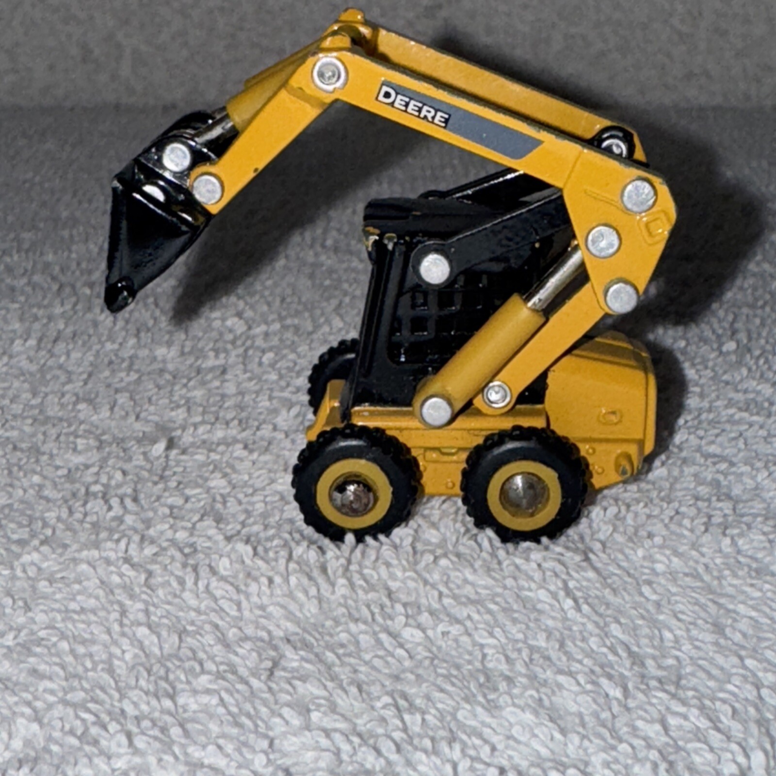 Ertl 1/64 John Deere 320D Skid Steer Model Loader