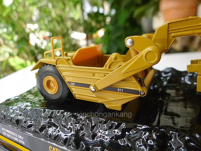 Diecast Masters 85695 – Caterpillar CAT 611 Wheel Tractor Scraper 1:64