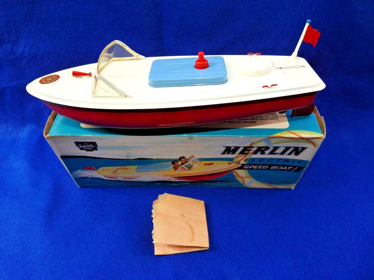 SUTCLIFFE MERLIN 1973 PRESSED STEEL ELECTRIC SPEED BOAT VNM IN BOX + FLAG