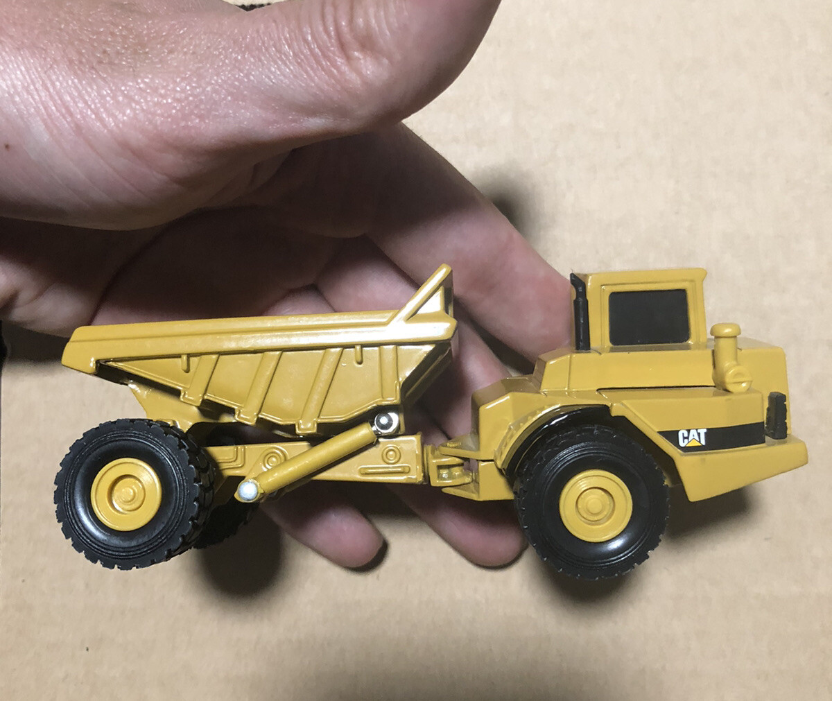 1998 Norscot Group 55706 Caterpillar D25D Articulated Truck 1:64 Diecast