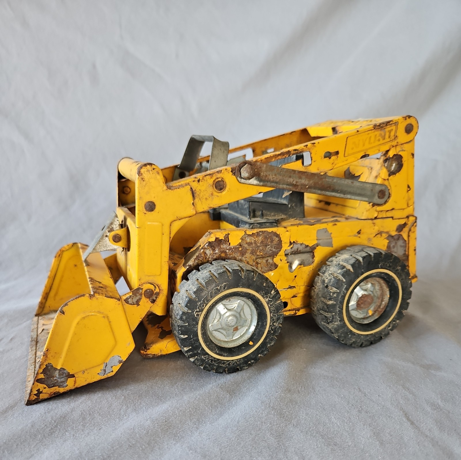 Vintage Nylint Sand and Gravel Skidsteer Pressed Steel Loader Made in USA
