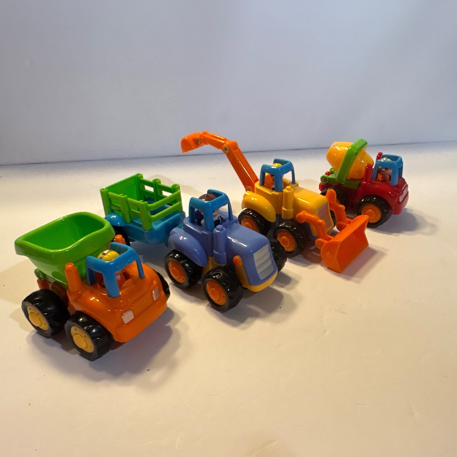 4pc Con. Vehicle Toy Lot DumpTruck Excavator Mixer Loader. All in working order