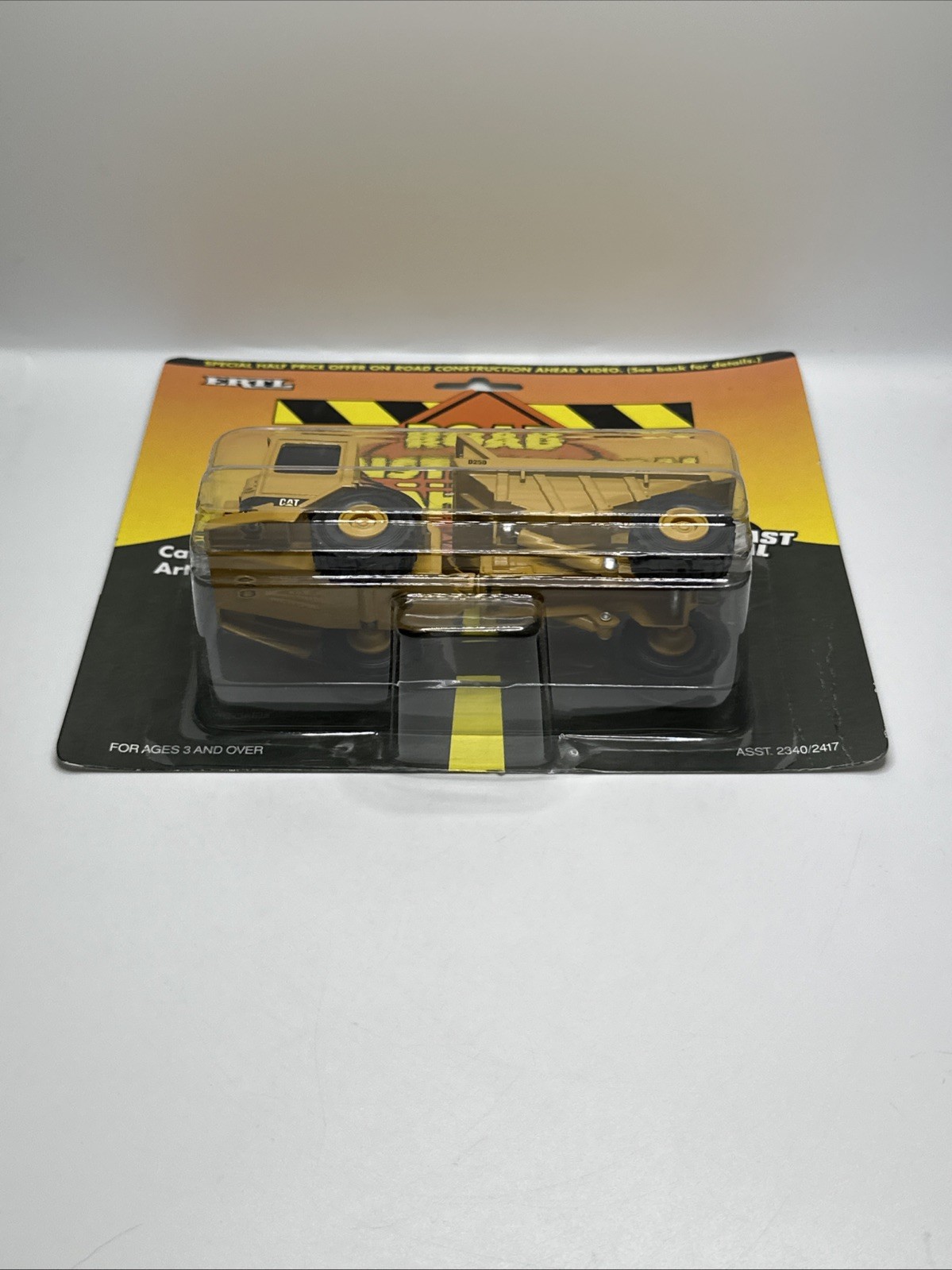Vintage Ertl Road Construction Caterpillar D25D Articulated Dump Truck, 1995 NEW