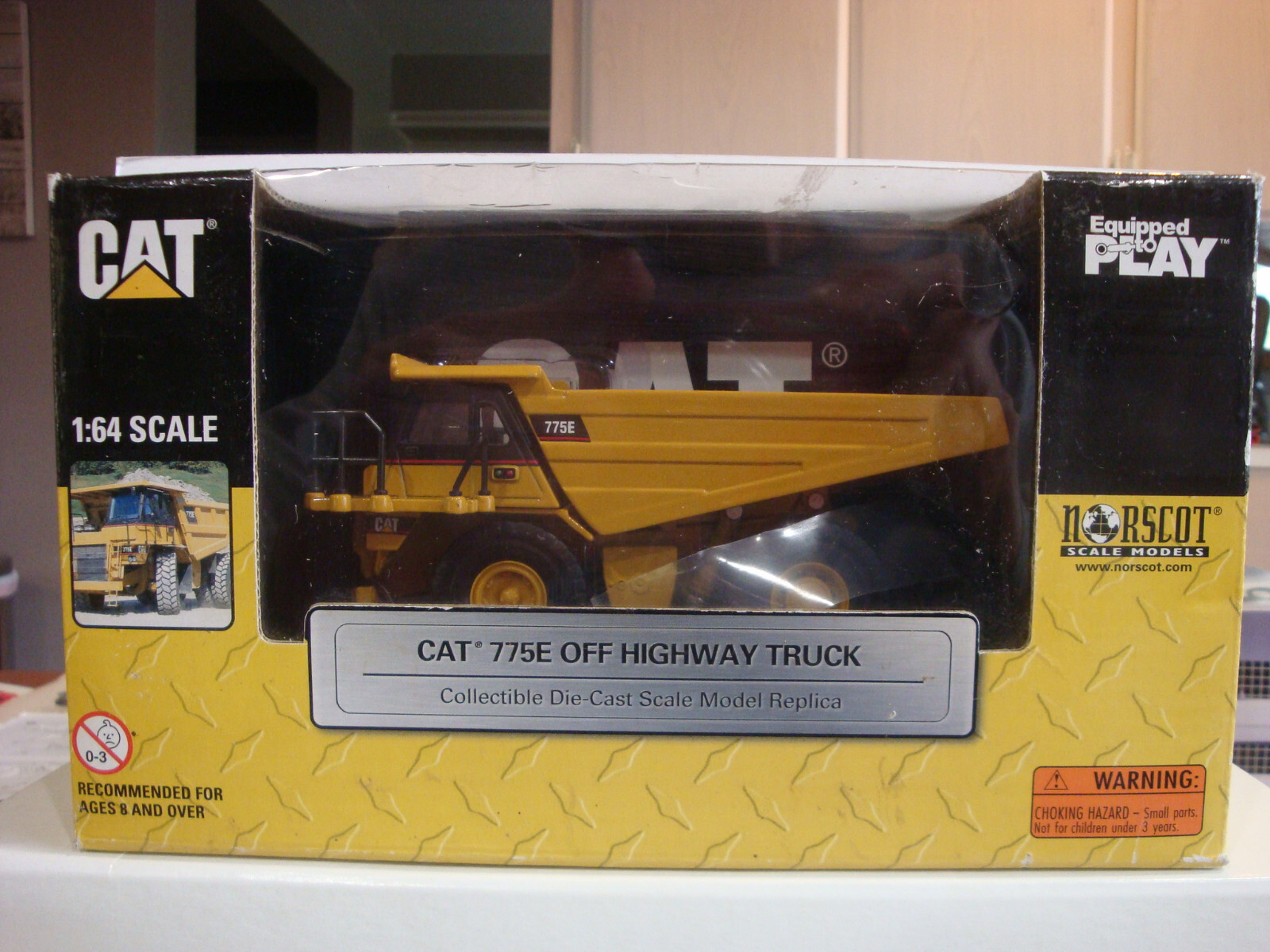 Norscot 1:64 Scale CAT 775E Off Highway Truck Yellow Fair Box