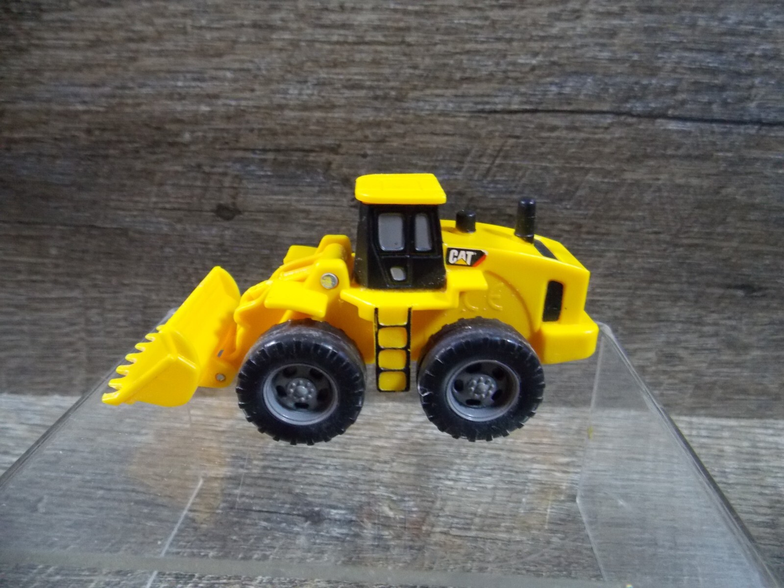 Yellow Metal & Plastic Tonka Tractor & 2 Plastic CAT Caterpillar Loaders 3 to 4″