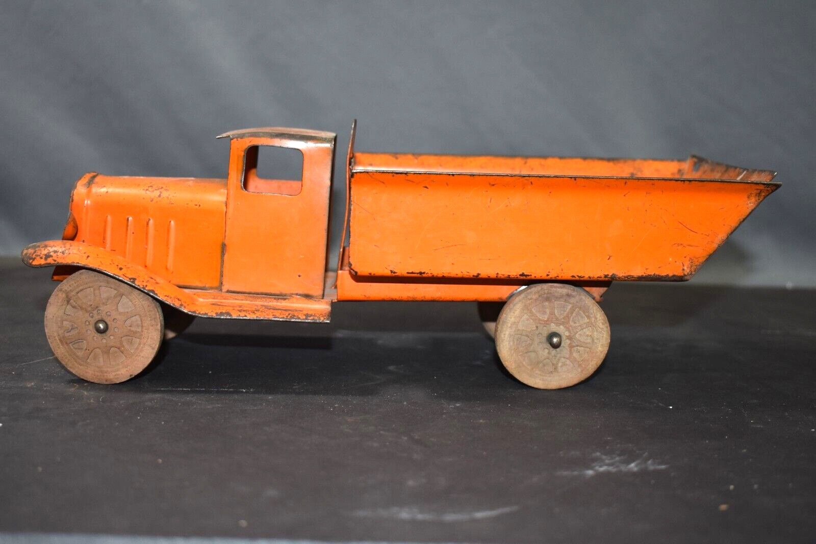 1930’s Wyandotte Dump Truck, Marx Toys, Orange, Wood wheels/Tires, Pressed Steel