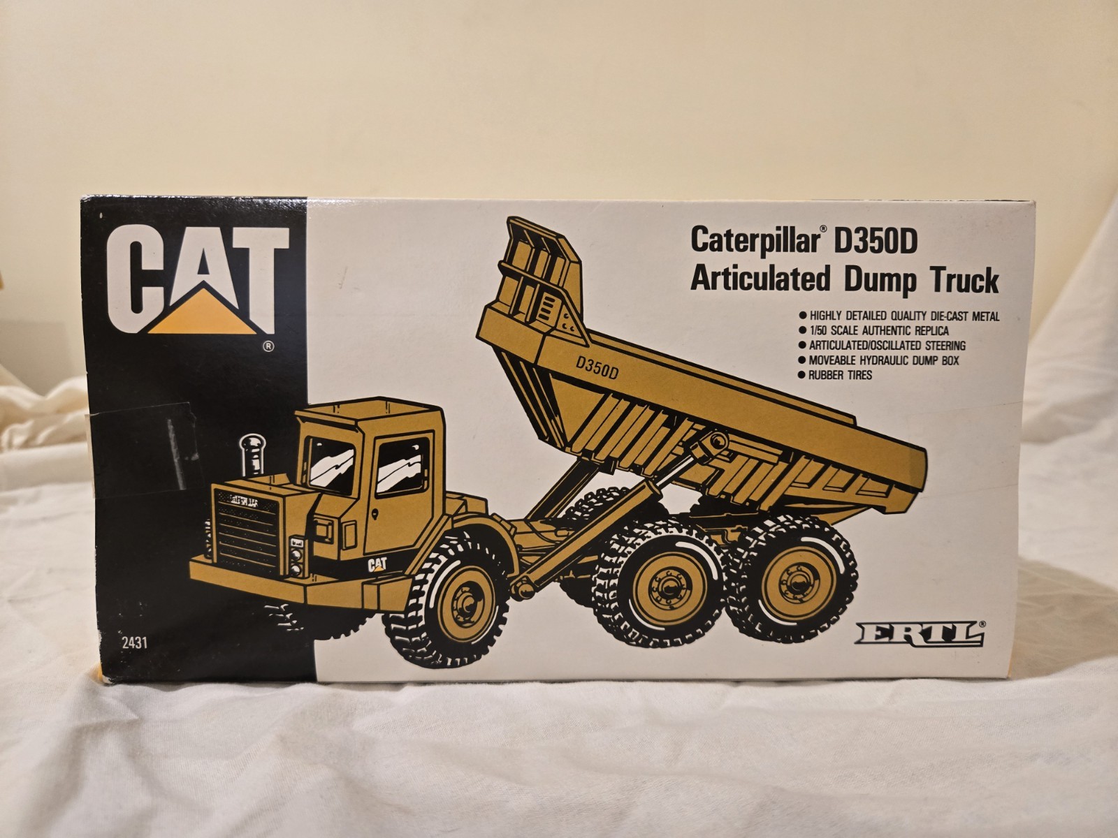 ERTL Caterpillar Cat D350D Articulating Dump Truck Die Cast Model