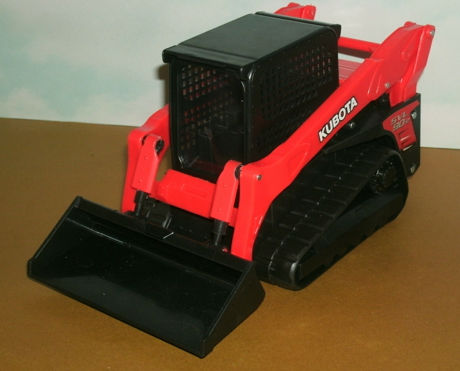 1/18 Scale Kubota SVL95-2 Tracked Skid Steer Loader Plastic Toy (8.5″) New-Ray