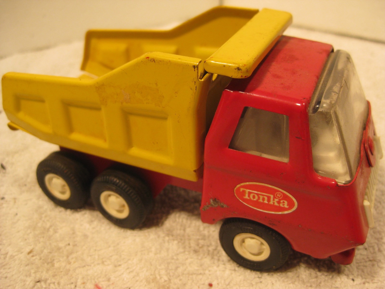 Vintage Tonka yellow and red pressed steel dump truck