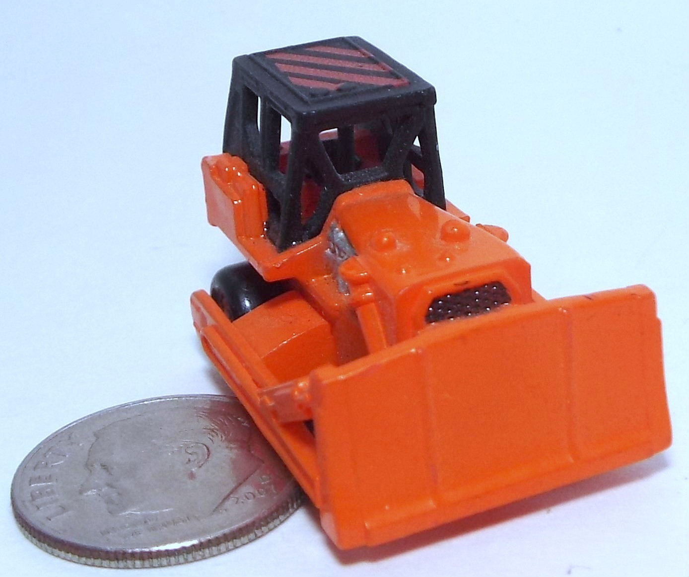 Small Micro Machine Bulldozer Construction Vehicle in Orange & Black