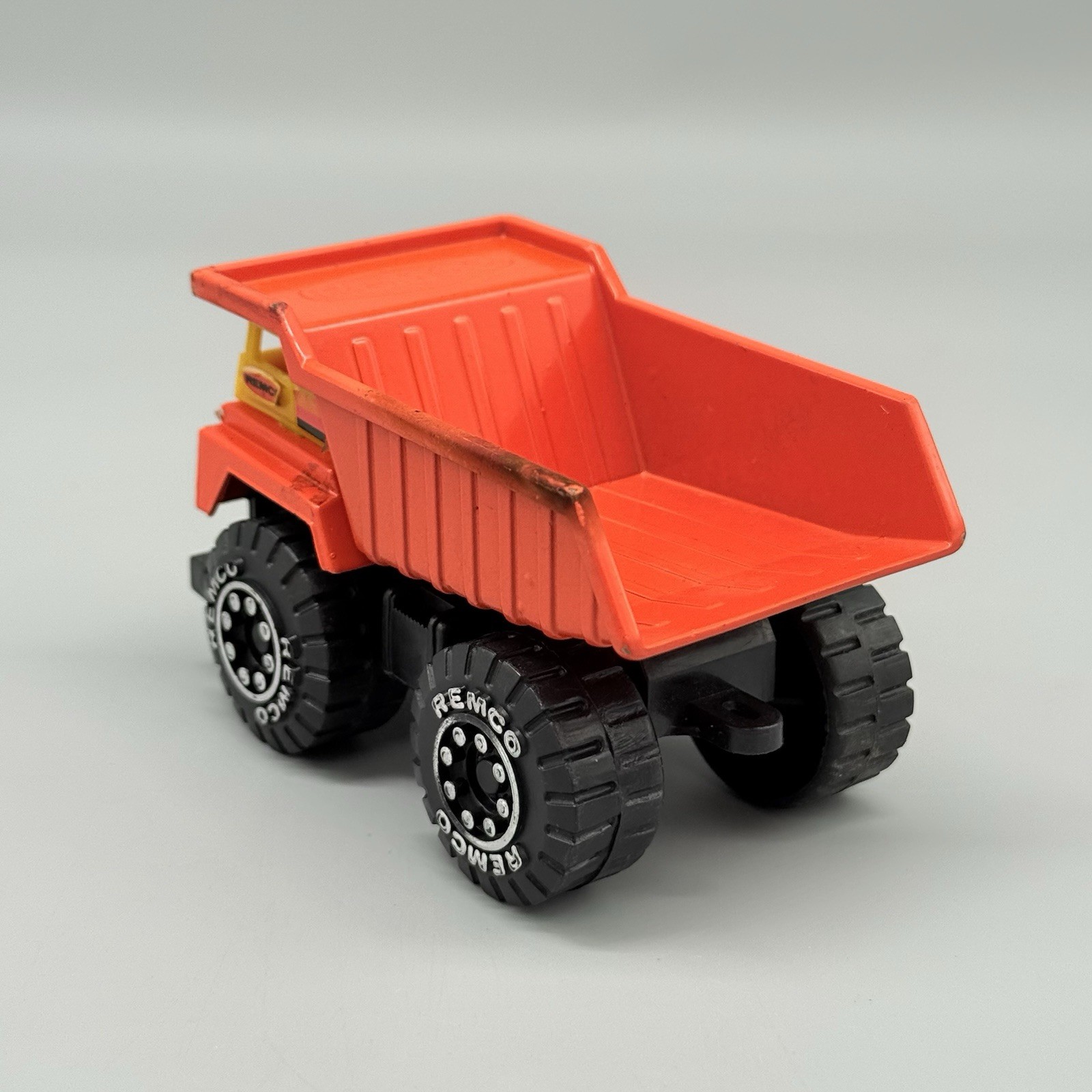 Vintage 1987 Remco Classic Orange Dump Truck Chunky Plastic Diecast 4”