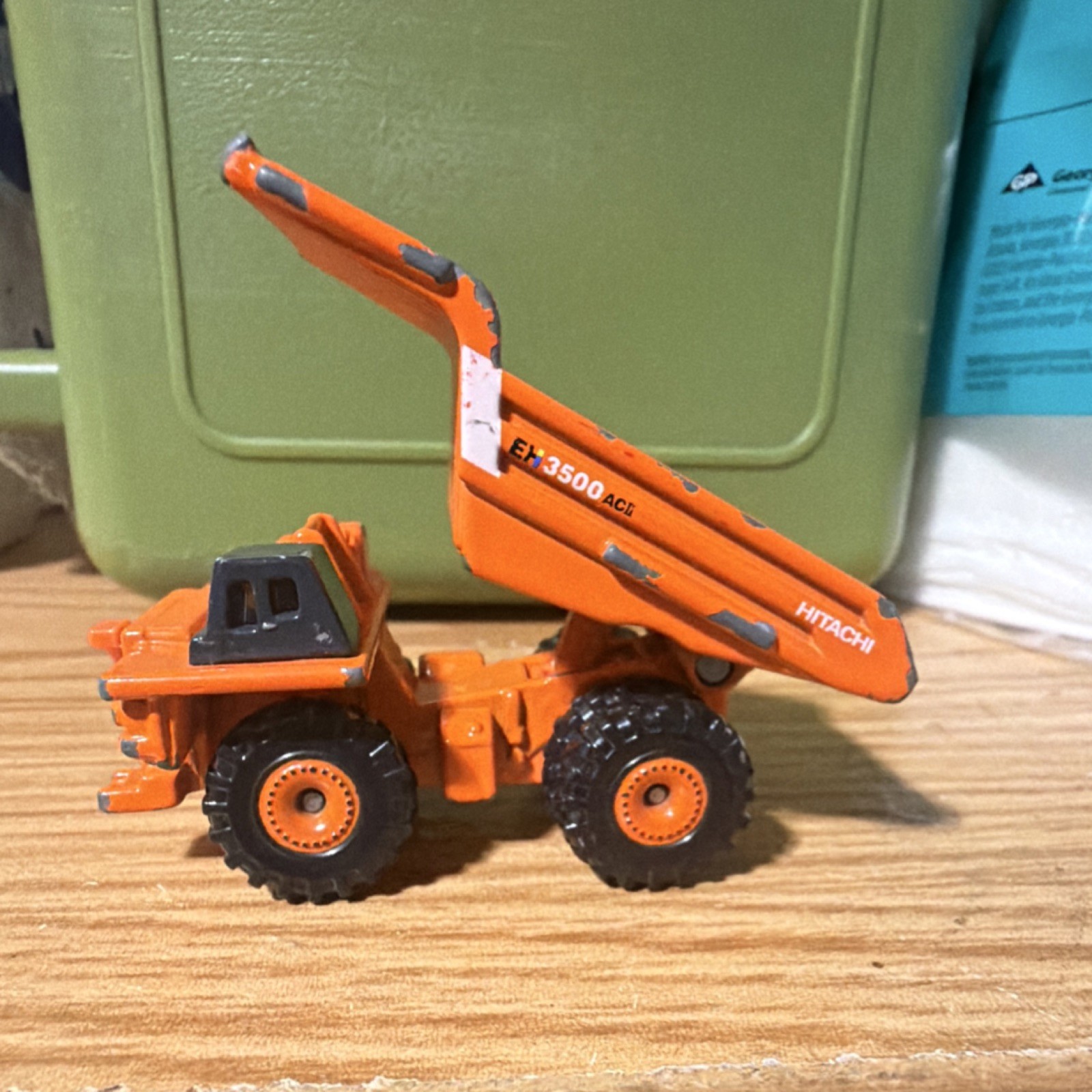 Tomica Hitachi EH3500ACII Dump Truck No.130 1:144 Diecast Tipping Orange