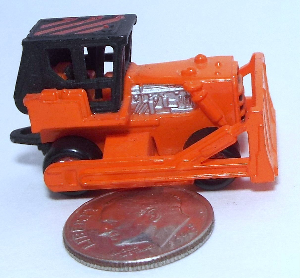 Small Micro Machine Bulldozer Construction Vehicle in Orange & Black