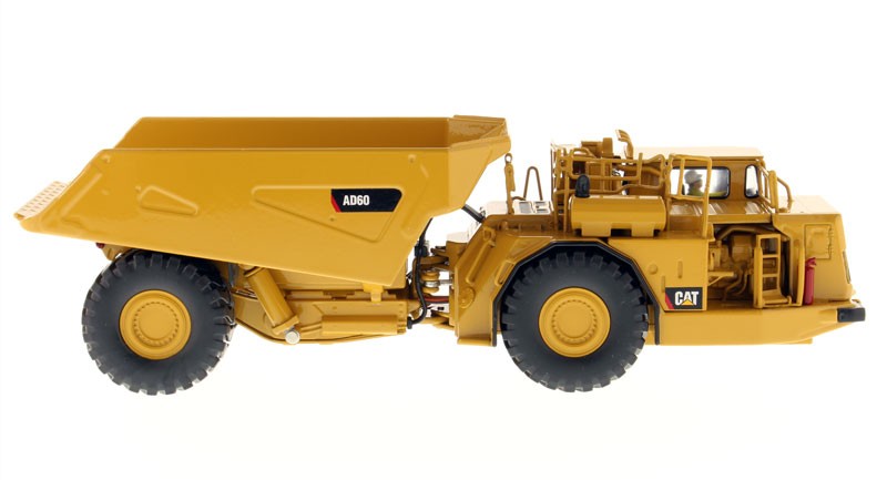 DIECAST MASTERS – CATERPILLAR AD60 dumper tunnel boring machine with driver and box met…