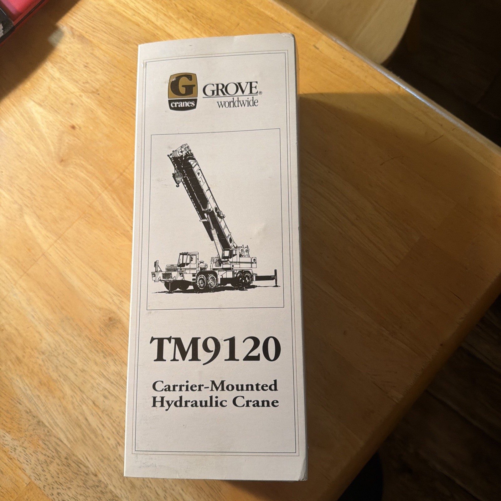 Grove Worldwide Carrier-Mounted Hydraulic Diecast Collectors Model TM9120. NEW