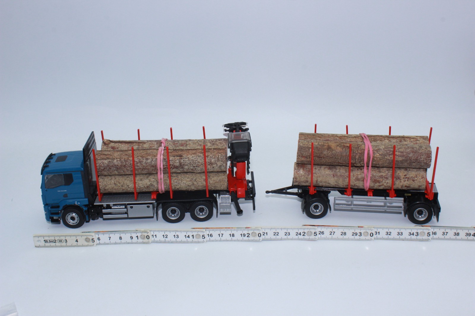 Conrad 81233 DOLL Short Log Trailer MAN TGS TN EPSILON Q17Z Masterdrive 1:50 NEW