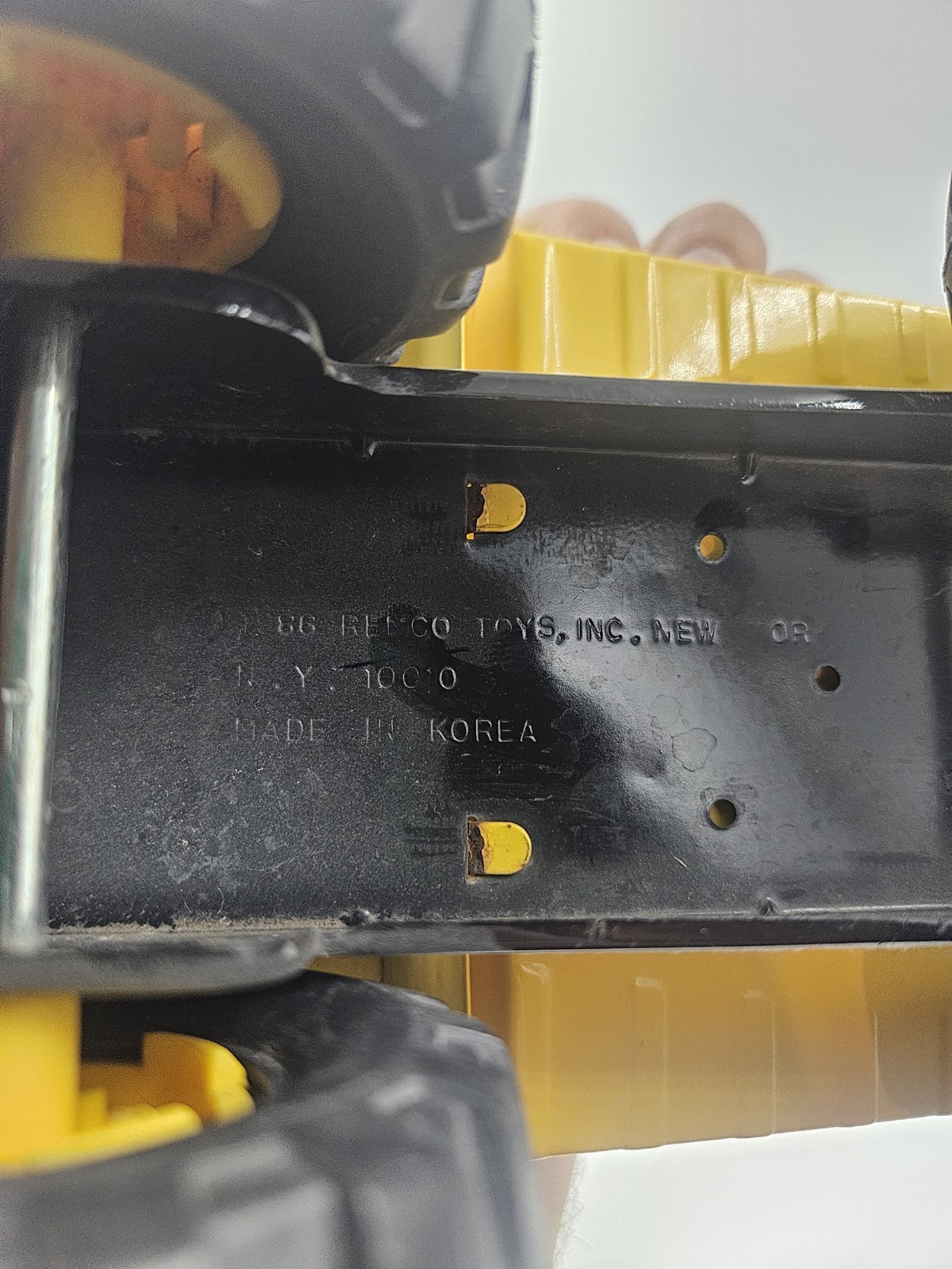 Vintage 1986 Remco Caterpillar Dump Truck Yellow Pressed Steel