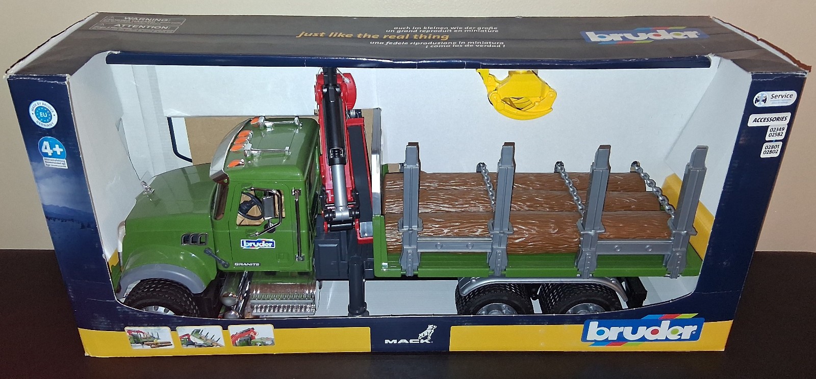 NEW BRUDER MACK GRANITE TIMBER TRUCK WITH LOADING CRANE & LOGS
