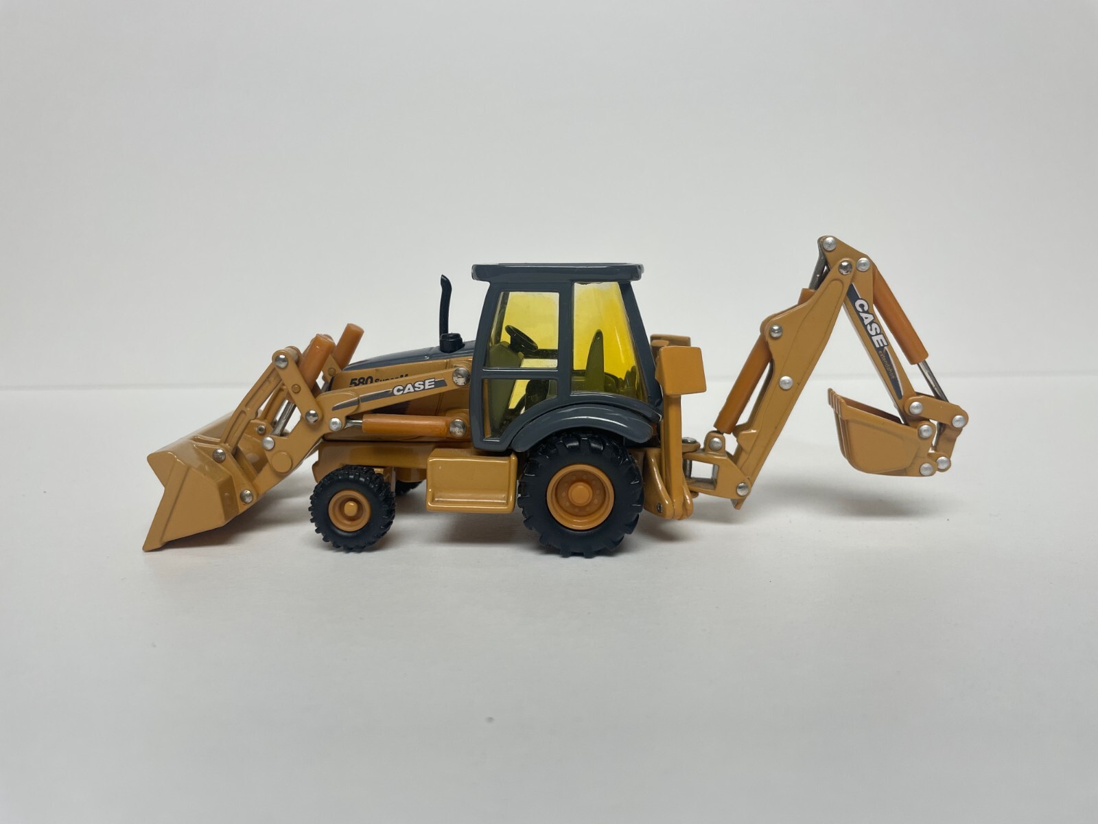 Ertl Case 580 Super M Loader Backhoe 1:50 Die Cast Replica Toy / model