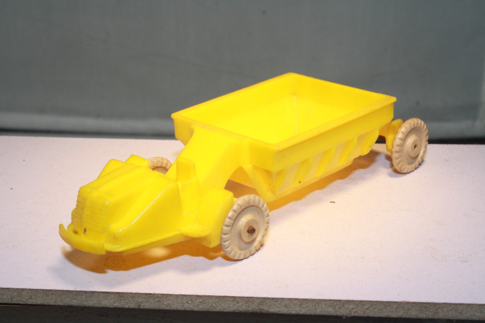 1950s Plastic Earth Mover Toy Banner Toys Made in USA