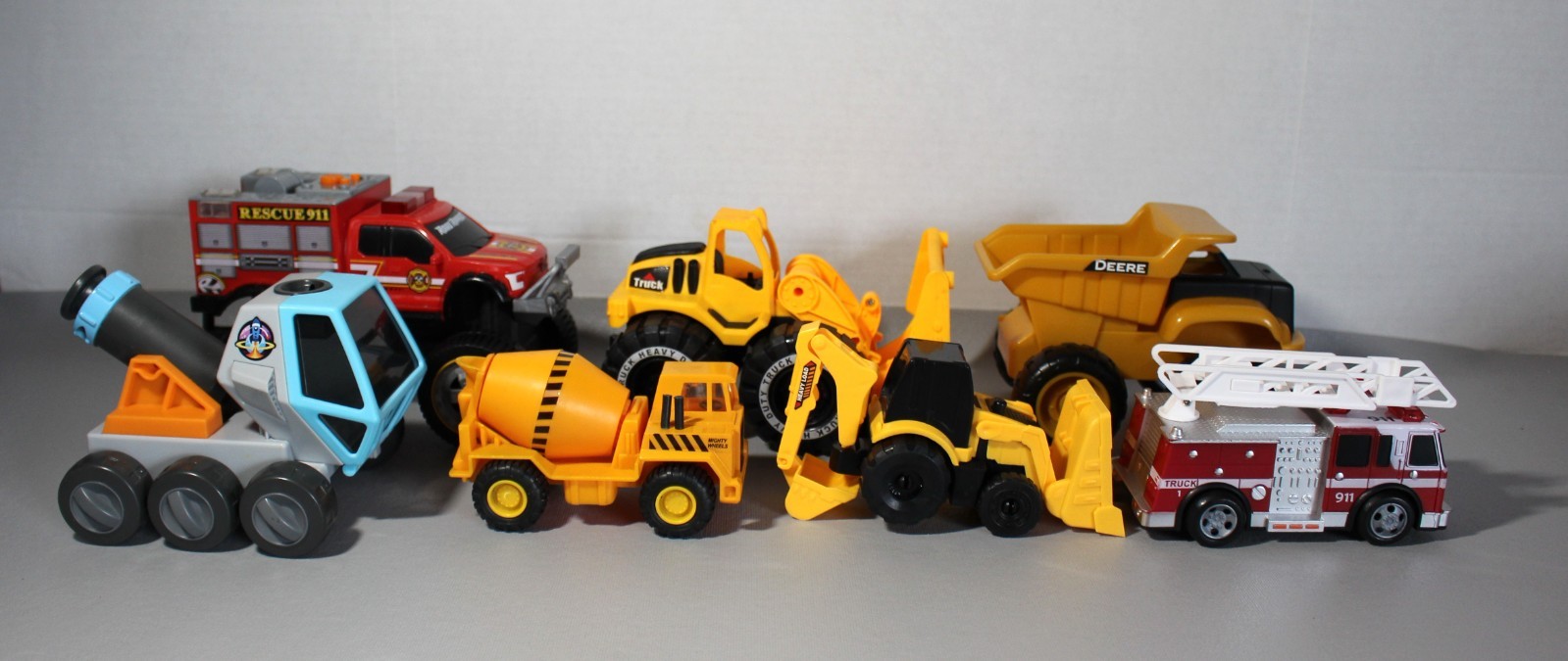 Mixed Lot Of 7 Plastic Play Construction Fire Truck Rescue Road Ripper Vehicles