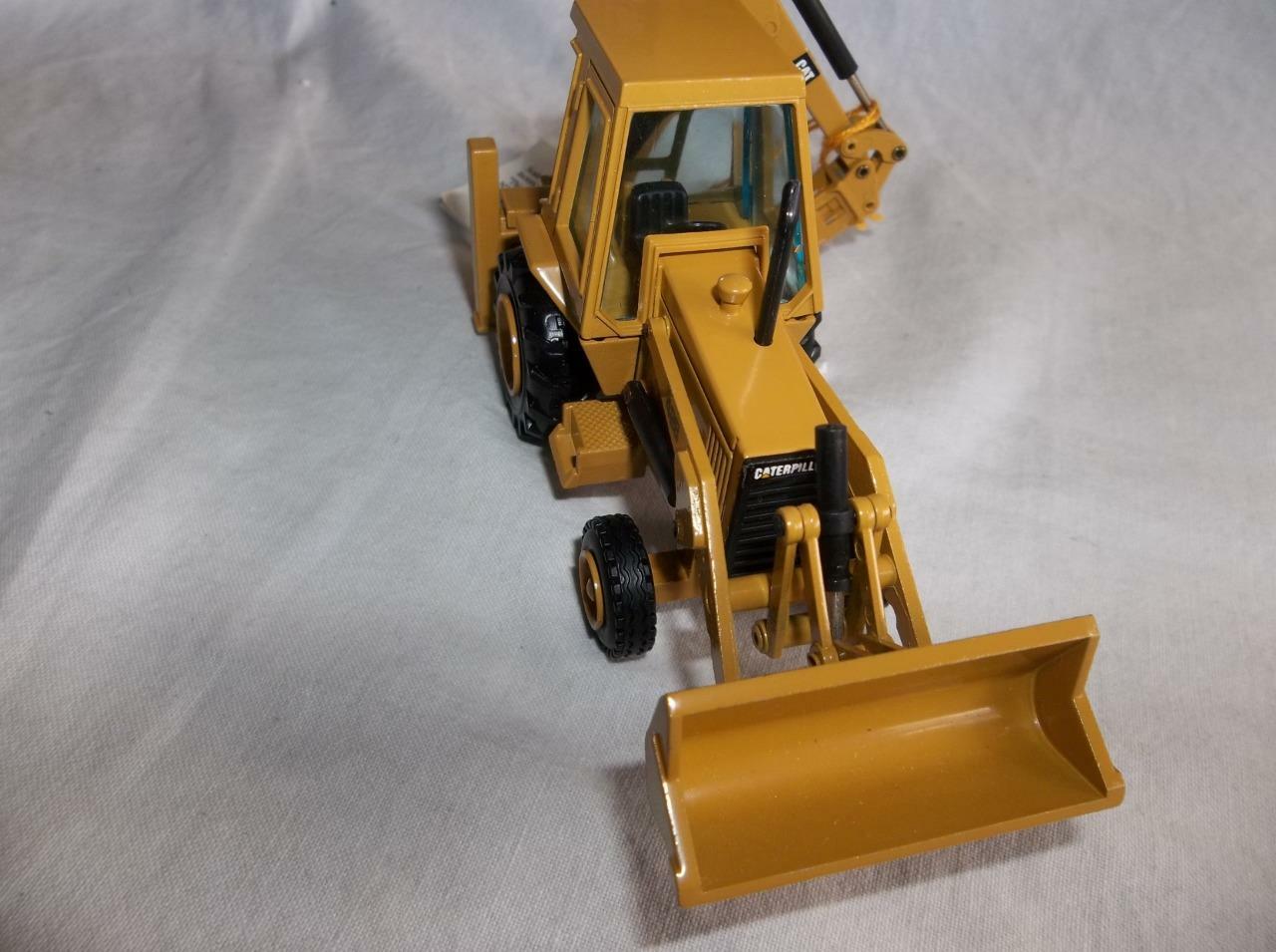 MIB NZG #378.1 CAT 428 Backhoe Loader w/Hydraulic Hammer Ser No 225 1:50 Scale