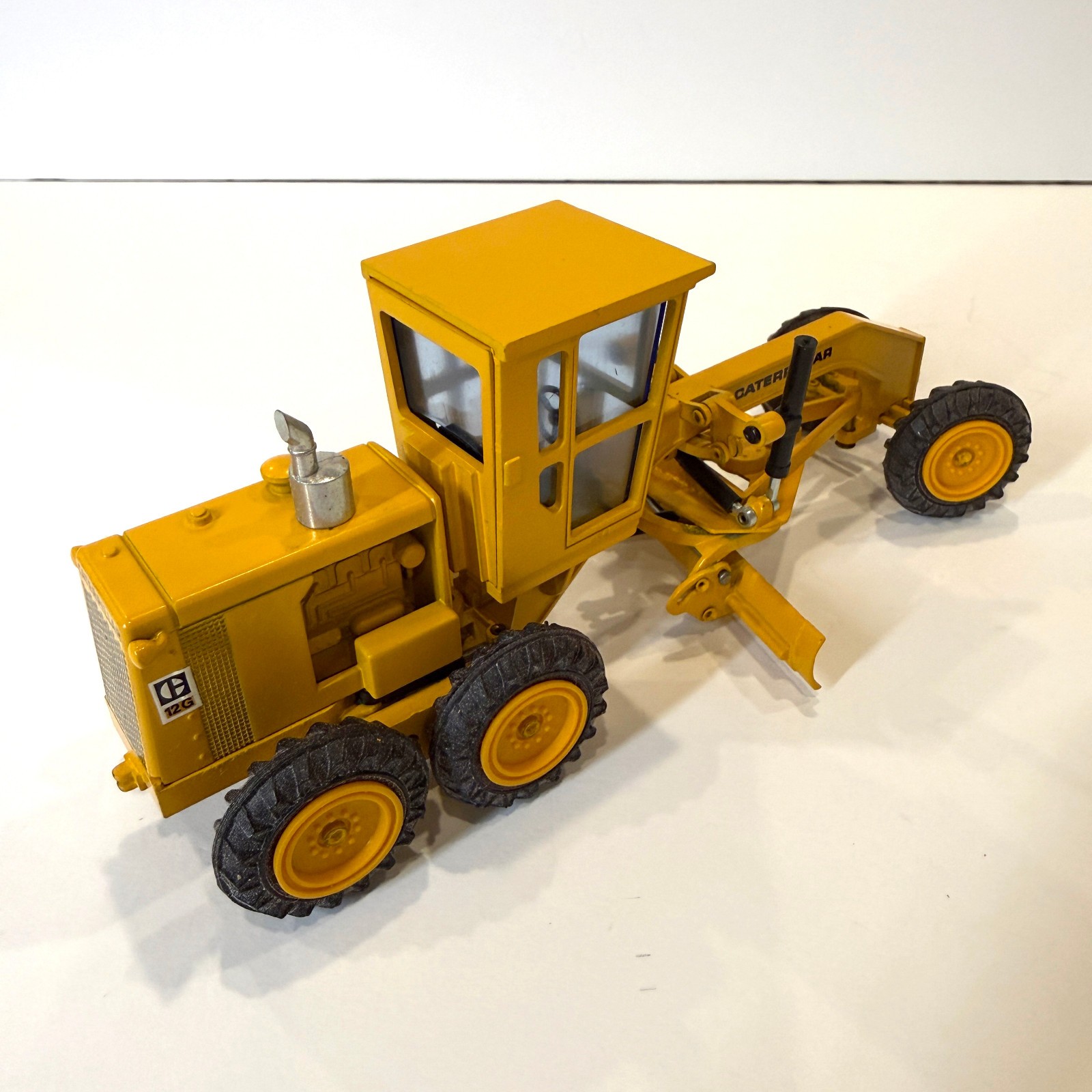 CAT Motorgrader Model 12G Scale 1:50 Die-cast Model NZG Models