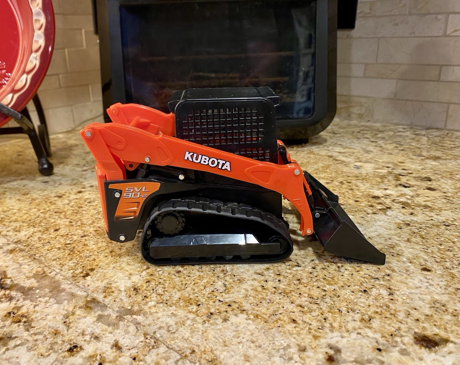 1/18 Scale Kubota SVL90-2 Tracked Skid Steer Loader Plastic Toy (8″) New-Ray