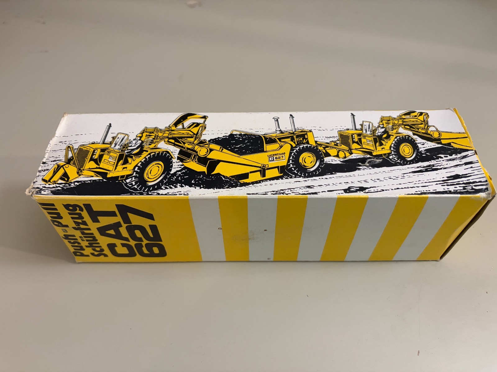 Caterpillar Cat 627 Push-Pull Scraper Yellow – NZG 1:50 Scale Model NEW