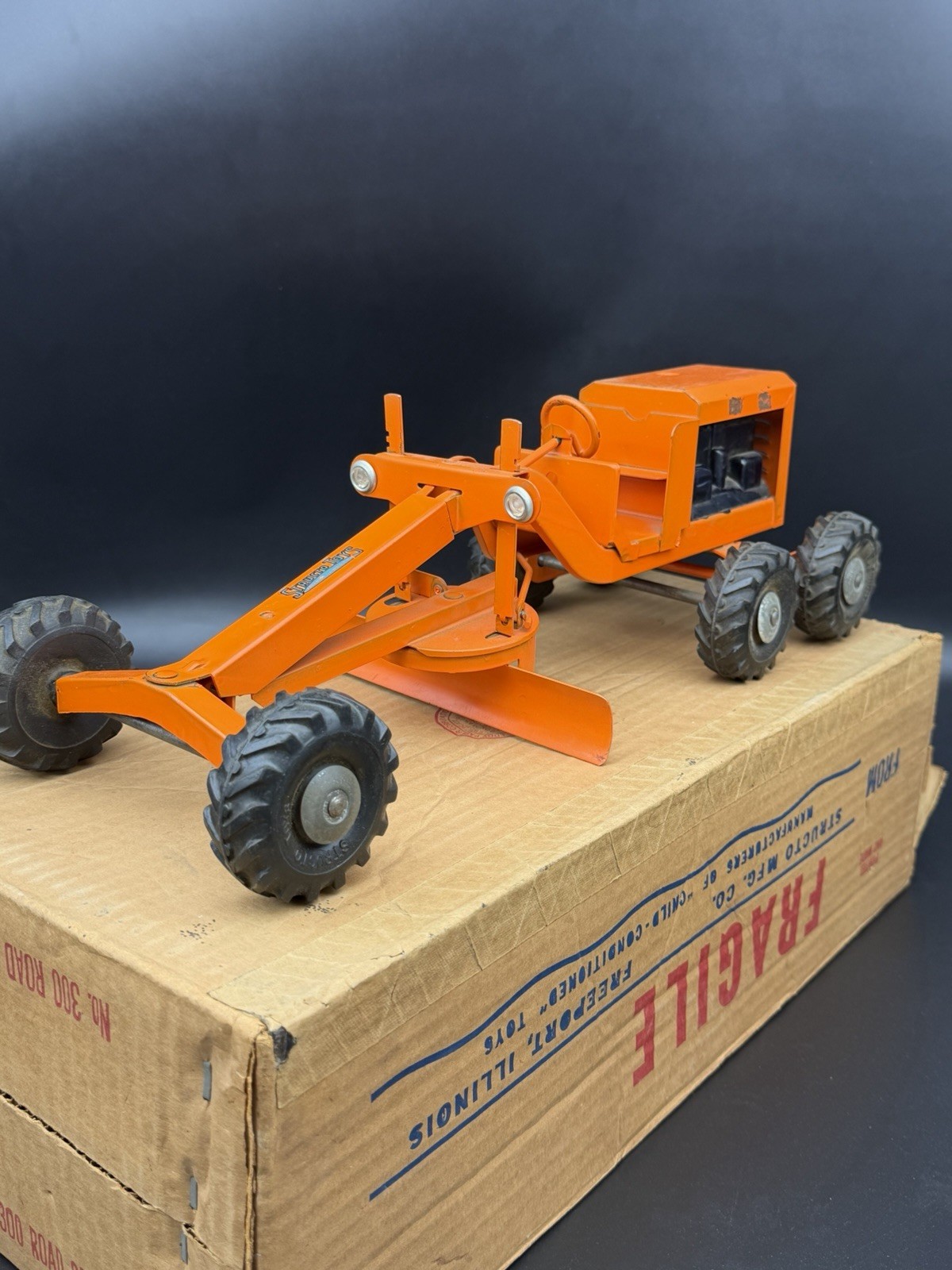 Vintage Structo Toys Road Grader No. 300 Orange Pressed Steel W/ Box