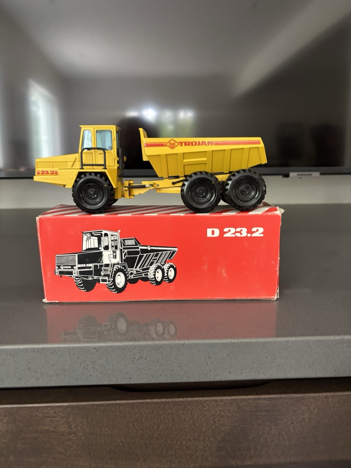 O&K Faun D23.2 Articulated Dump Truck – Yellow – NZG 1:50 Scale Model #301.1