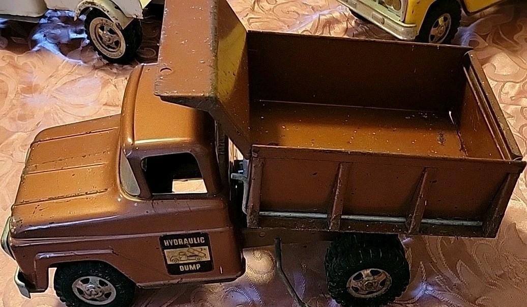 Vintage Tonka Hydraulic Bronze Dump Truck Toy Very Good Condition.