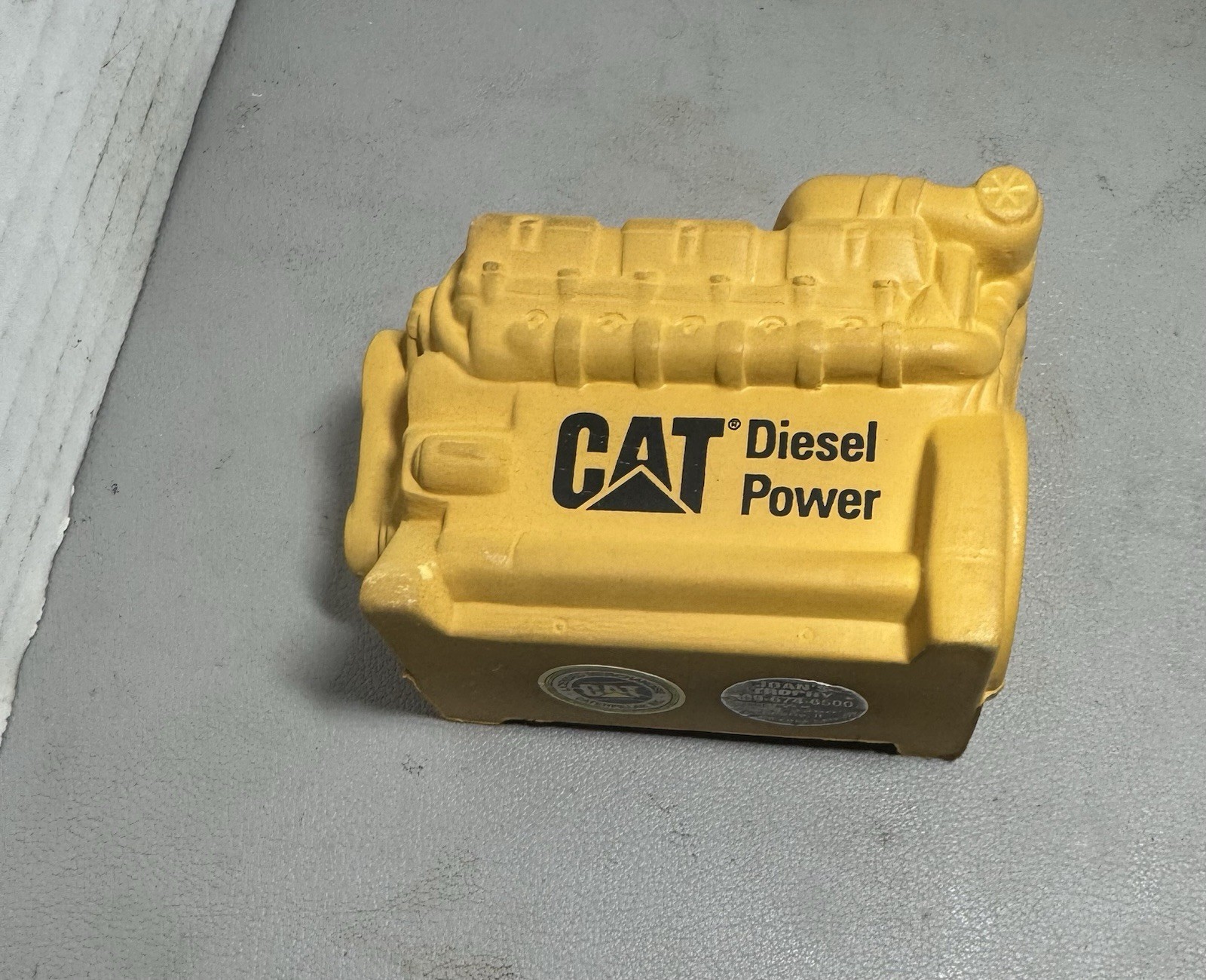 Caterpillar 416 backhoe die cast, CAT forklift & two stress balls.