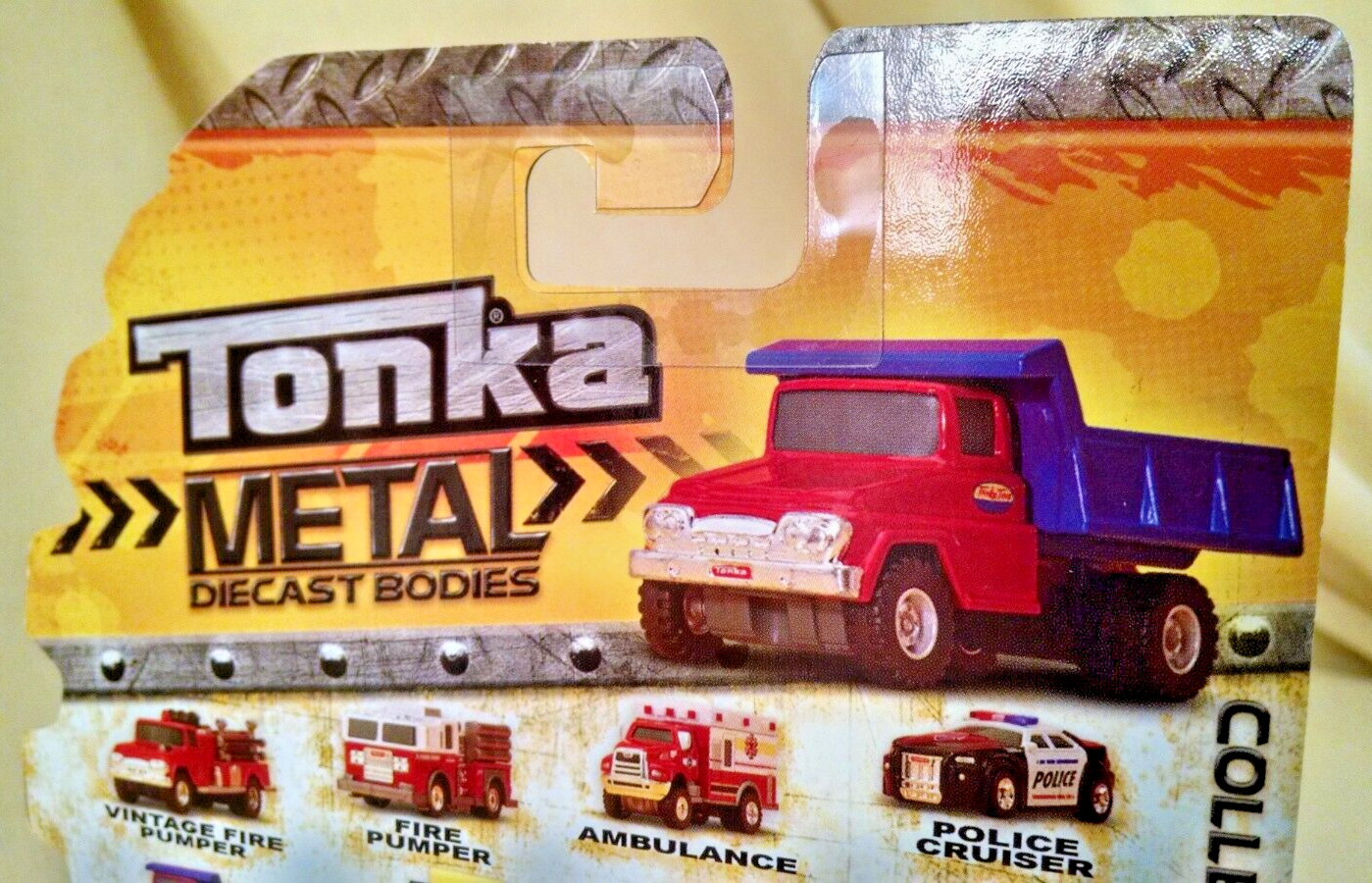 TONKA DUMP TRUCK METAL DIECAST BODIES ITEM NO 06402 NEW 2012 SEALED TOY YELLOW.