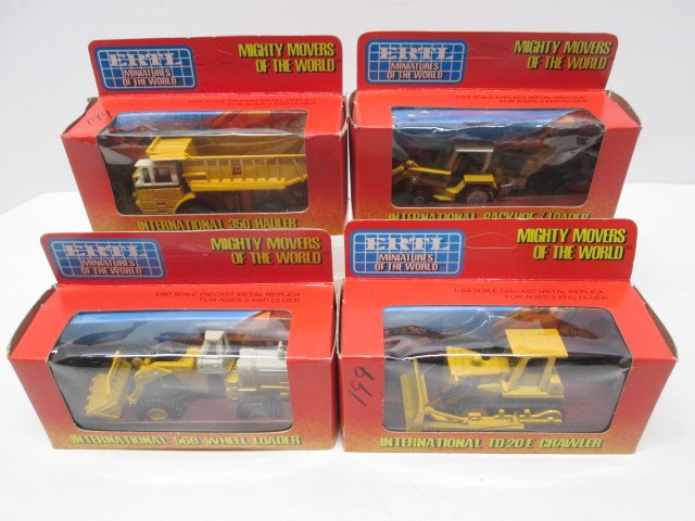 ERTL 1/64 MIGHTY MOVERS INTERNATIONAL CONSTRUCTION TOYS – LOT OF 4 – MINT-IN-BOX