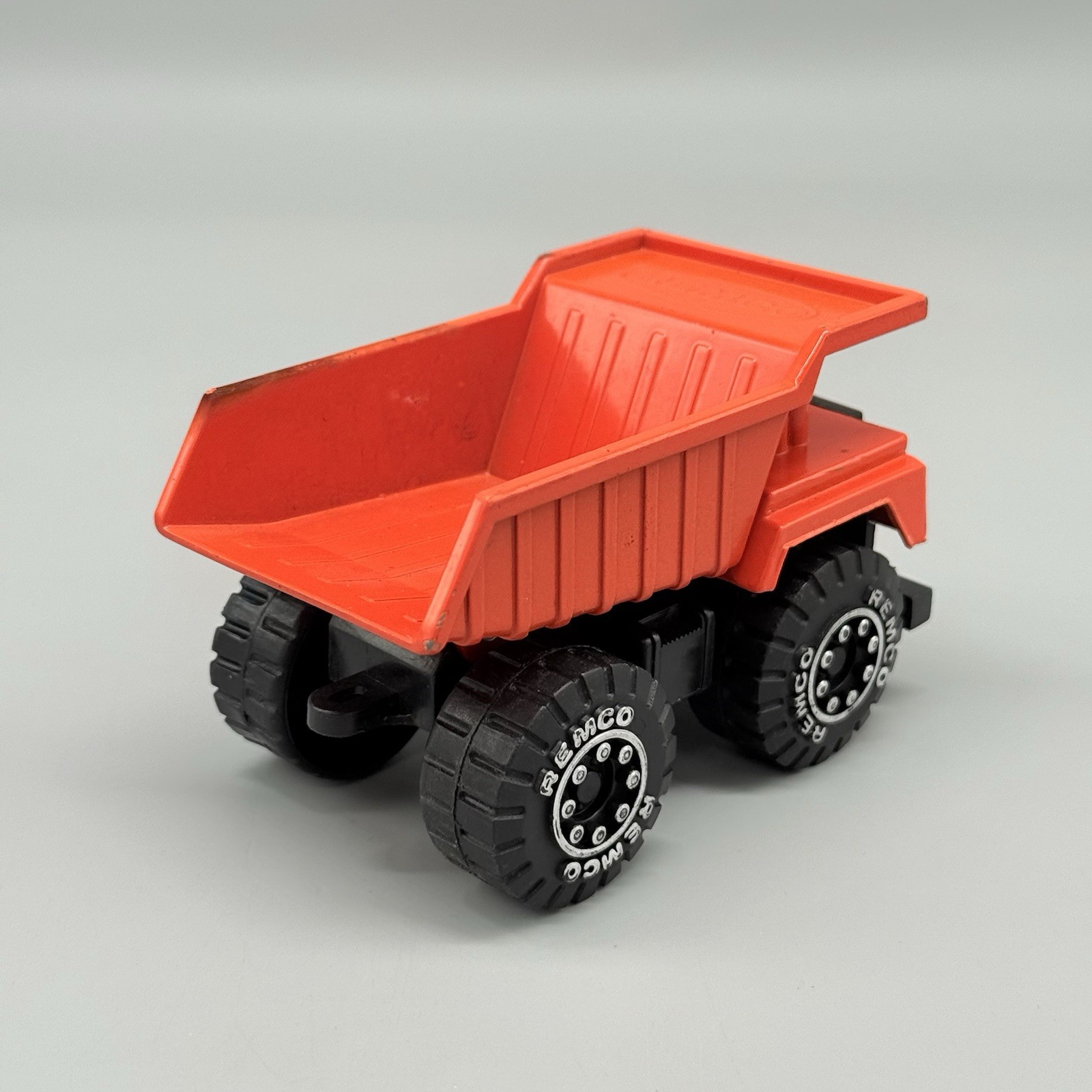 Vintage 1987 Remco Classic Orange Dump Truck Chunky Plastic Diecast 4”