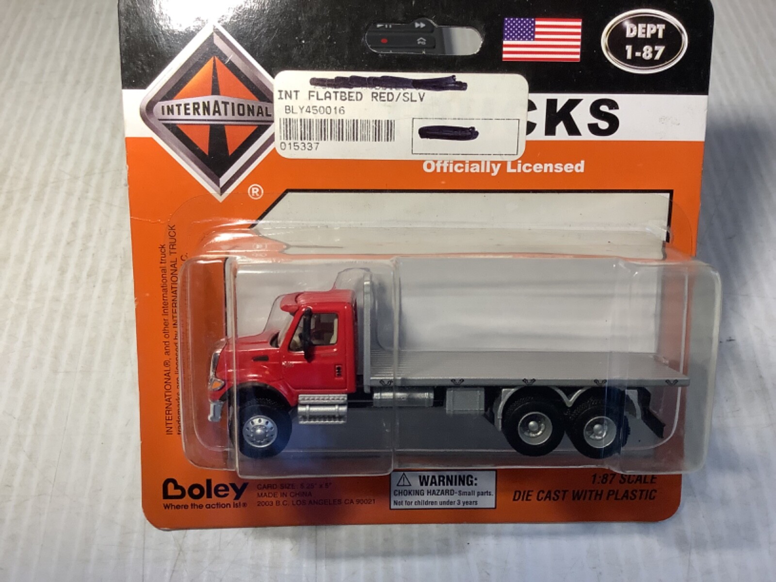 Boley 1:87 International 7600 Series Flatbed Truck – Red & Silver #4500-16
