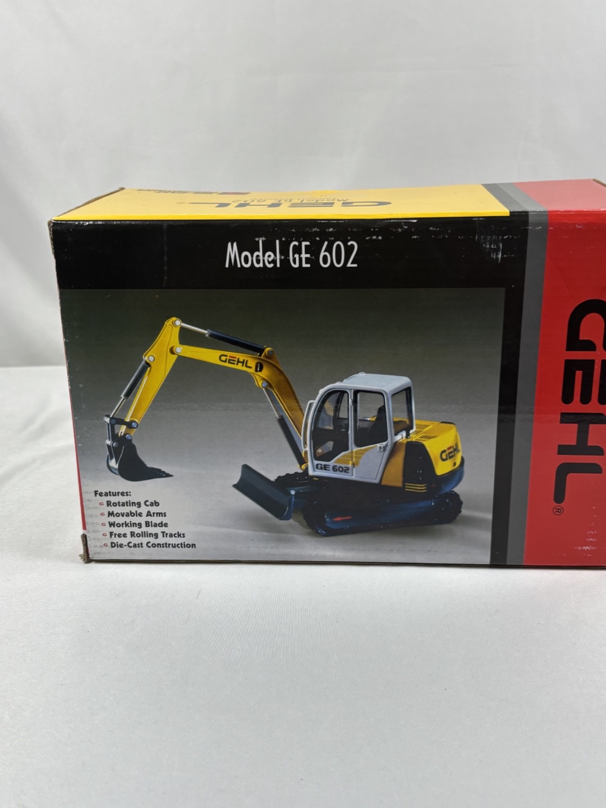 Die-Cast Promotions 1:25 Scale Model of a Gehl GE 602 Compact Excavator in Box