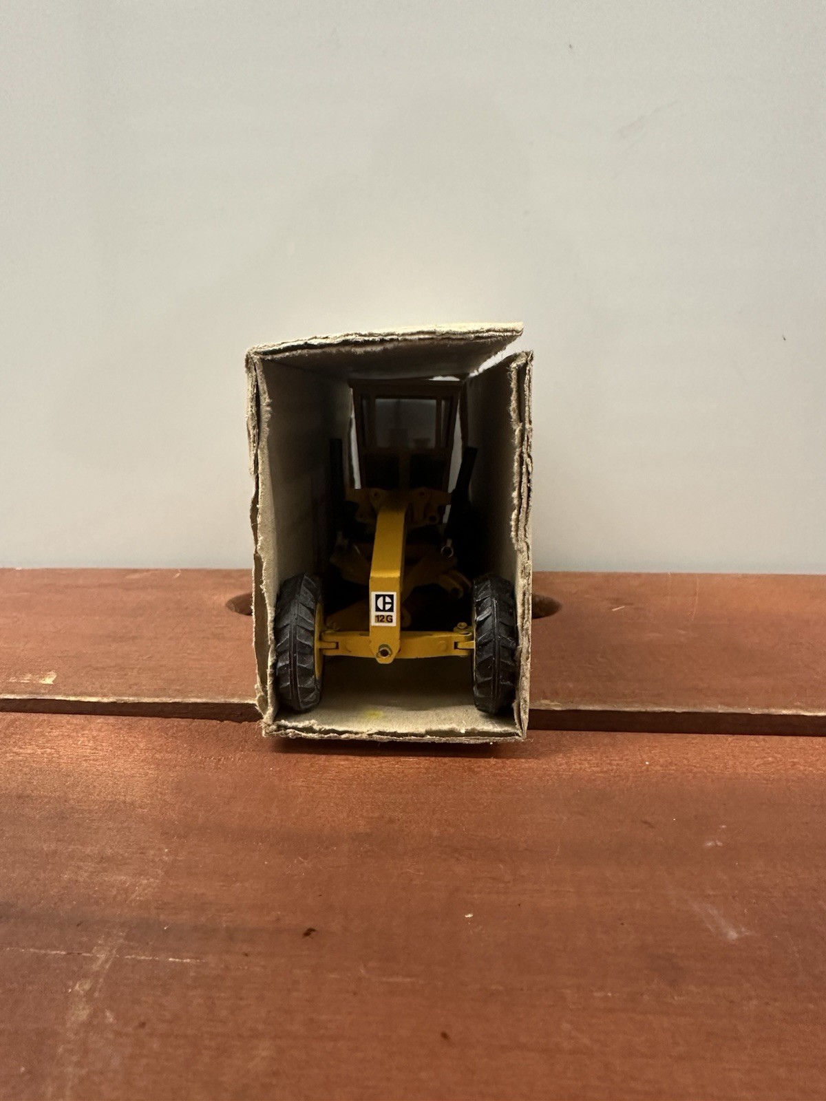 NZG Caterpillar 12G Construction Yellow Motor Grader with Original Packaging