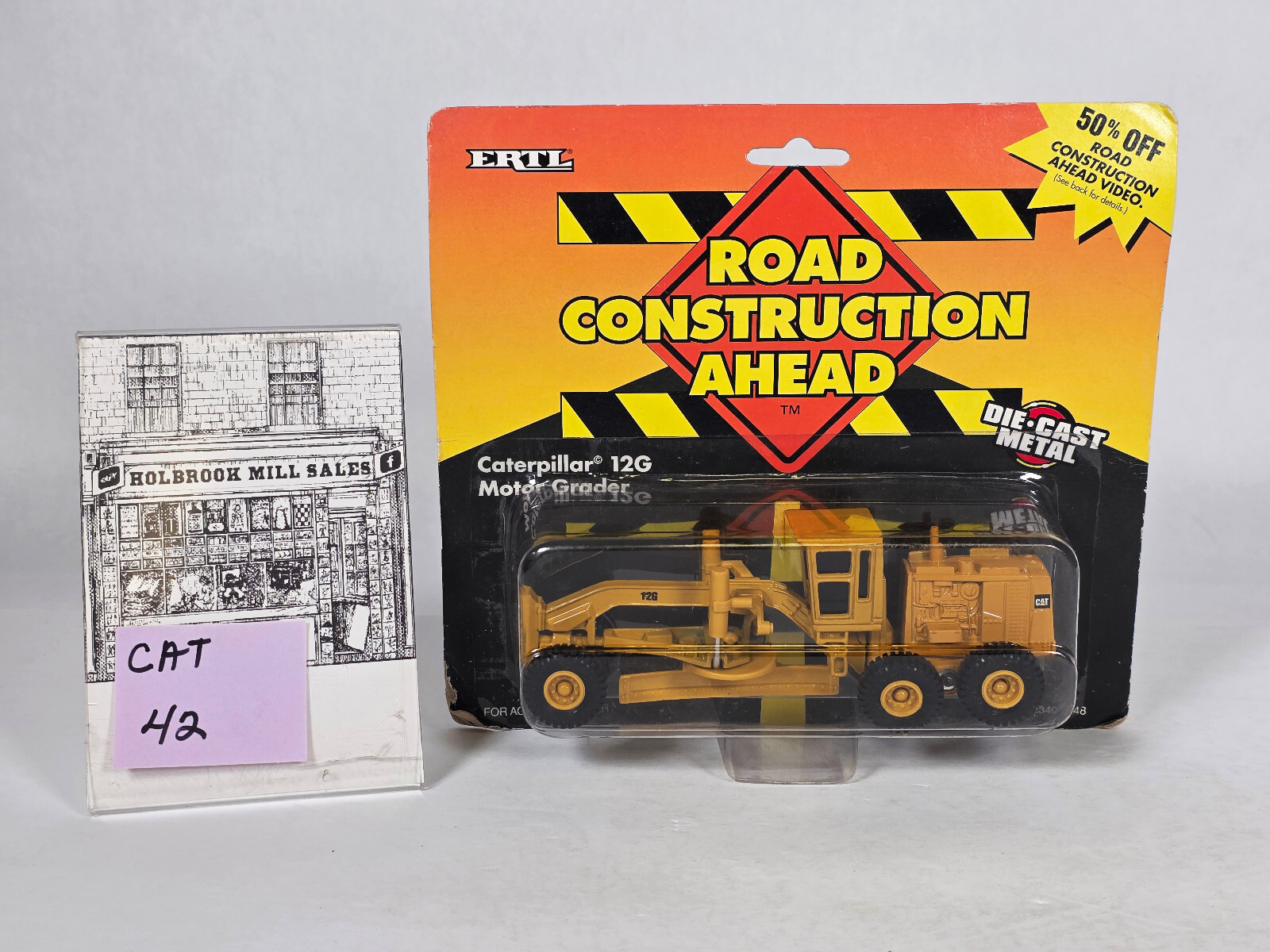 Ertl 1848 • Caterpillar • CAT 12G Motor Grader • New in Blister Pack
