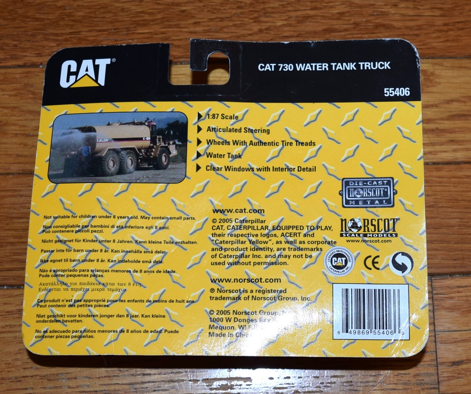 Norscot Equipped Play 1:87 Scale CAT 730 Water Tank Truck (55406) Die-Cast Model