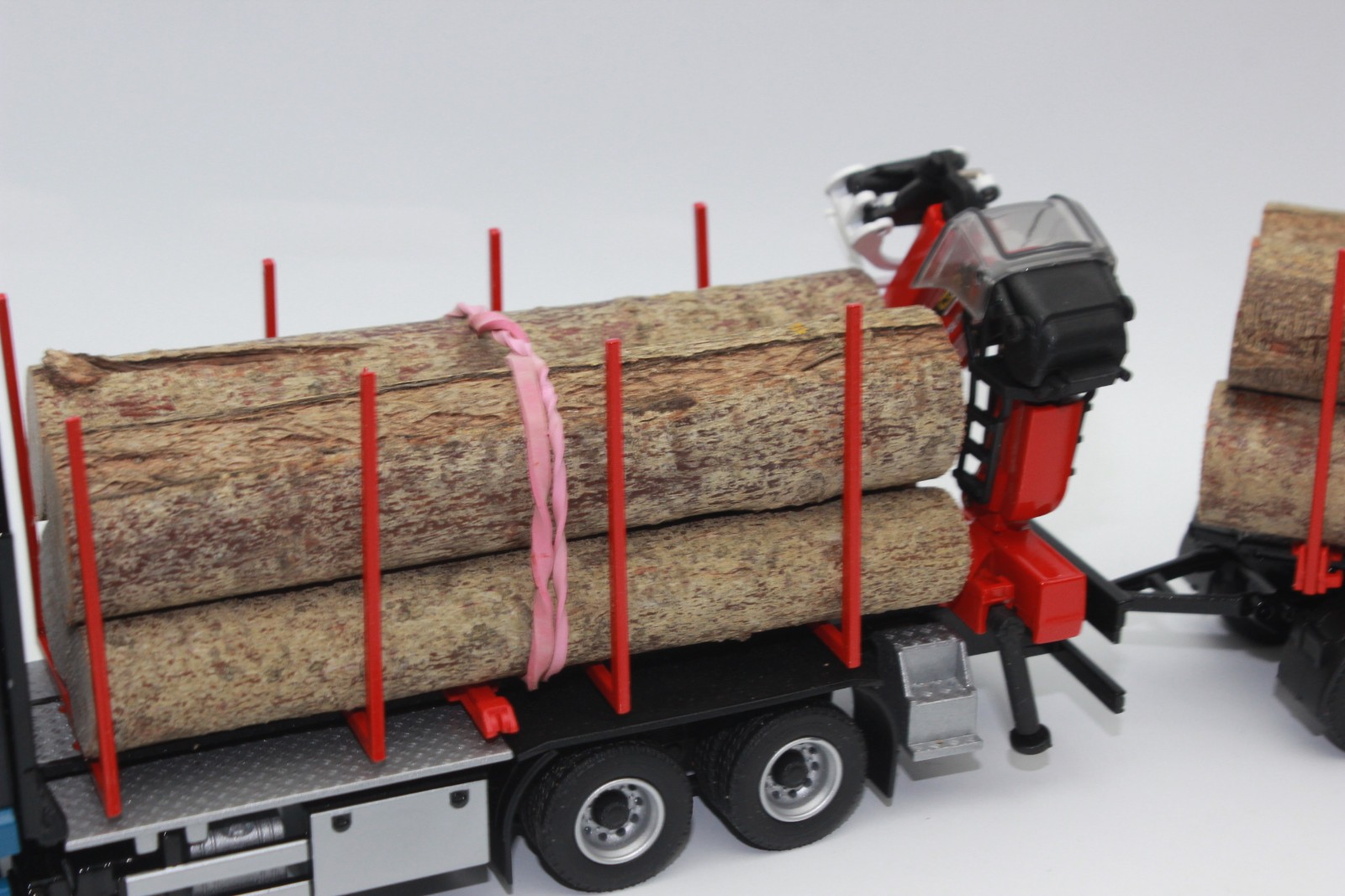 Conrad 81233 DOLL Short Log Trailer MAN TGS TN EPSILON Q17Z Masterdrive 1:50 NEW