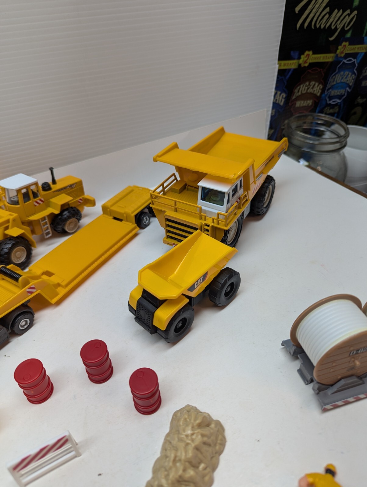 LOT OF 18 Construction Toys Trucks Men at Work Sign Rocks Steel Rolls Toy Set