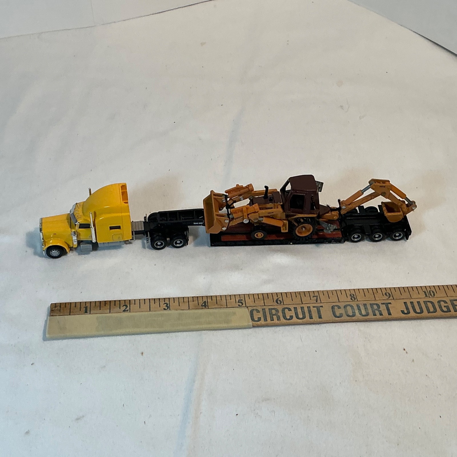 Norscot Flatbed Hauler With Ertl Backhoe Loader