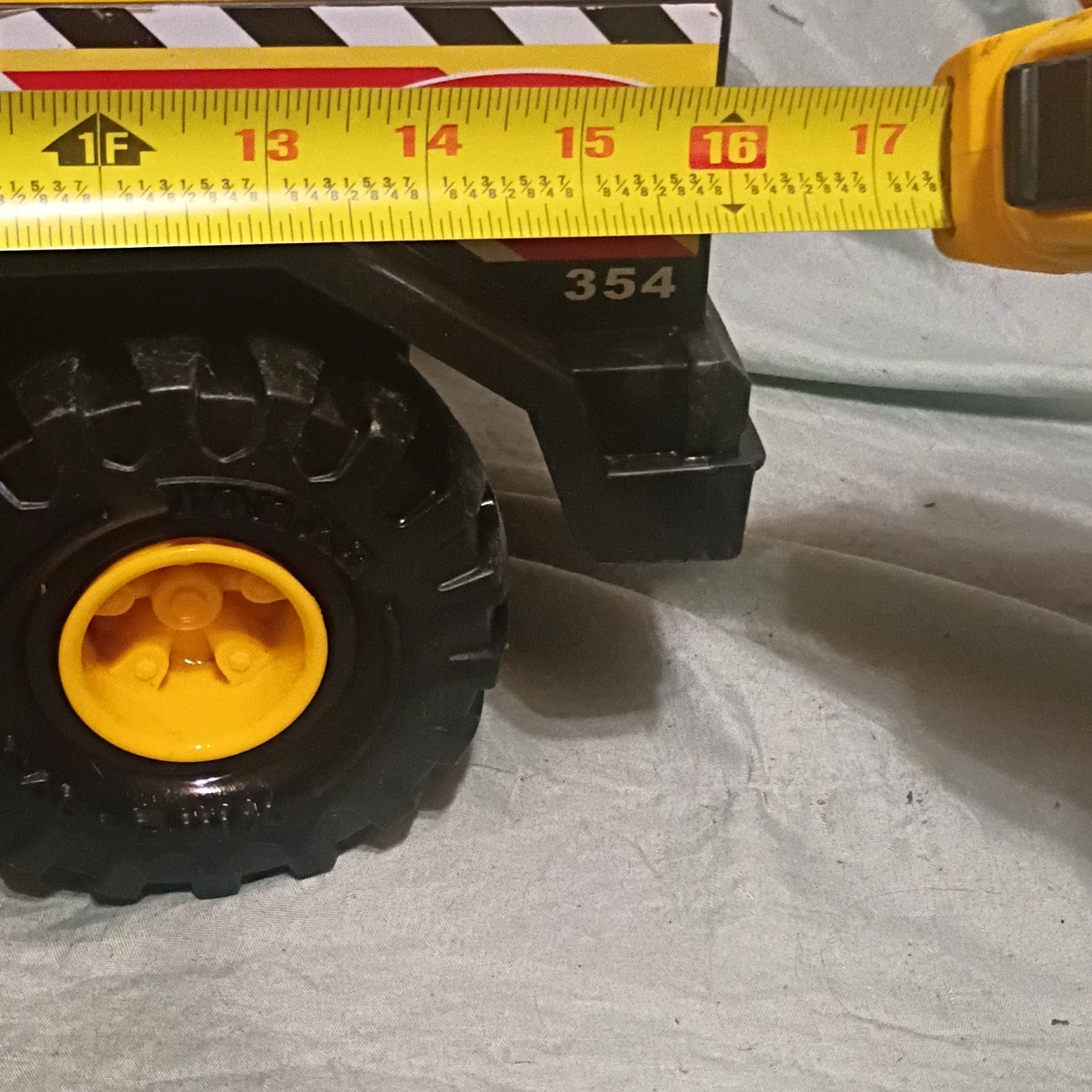 Tonka 354 Yellow Black Plastic Dump Truck Toy with Dump Bed