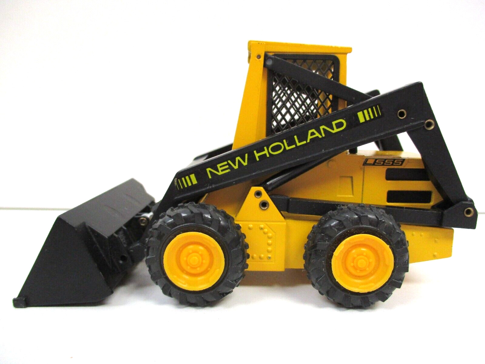 VINTAGE NZG – SPERRY / NEW HOLLAND L-555 SUPER BOOM SKID STEER LOADER – 1/25